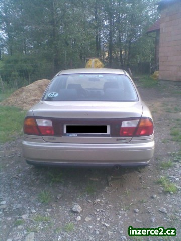 Mazda 323 1.5 16v sedan, r.v. 97 N.D_2 114071_2.jpg